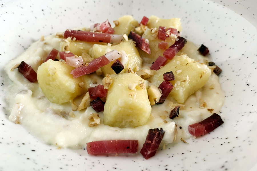 Ricetta gnocchi speck e noci